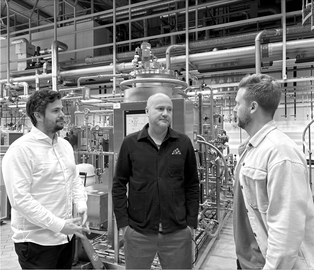 Filip Åsblom and Niklas Post of Digital Tvilling with Jacob Peterson of Curve, in a bioproduction facility.